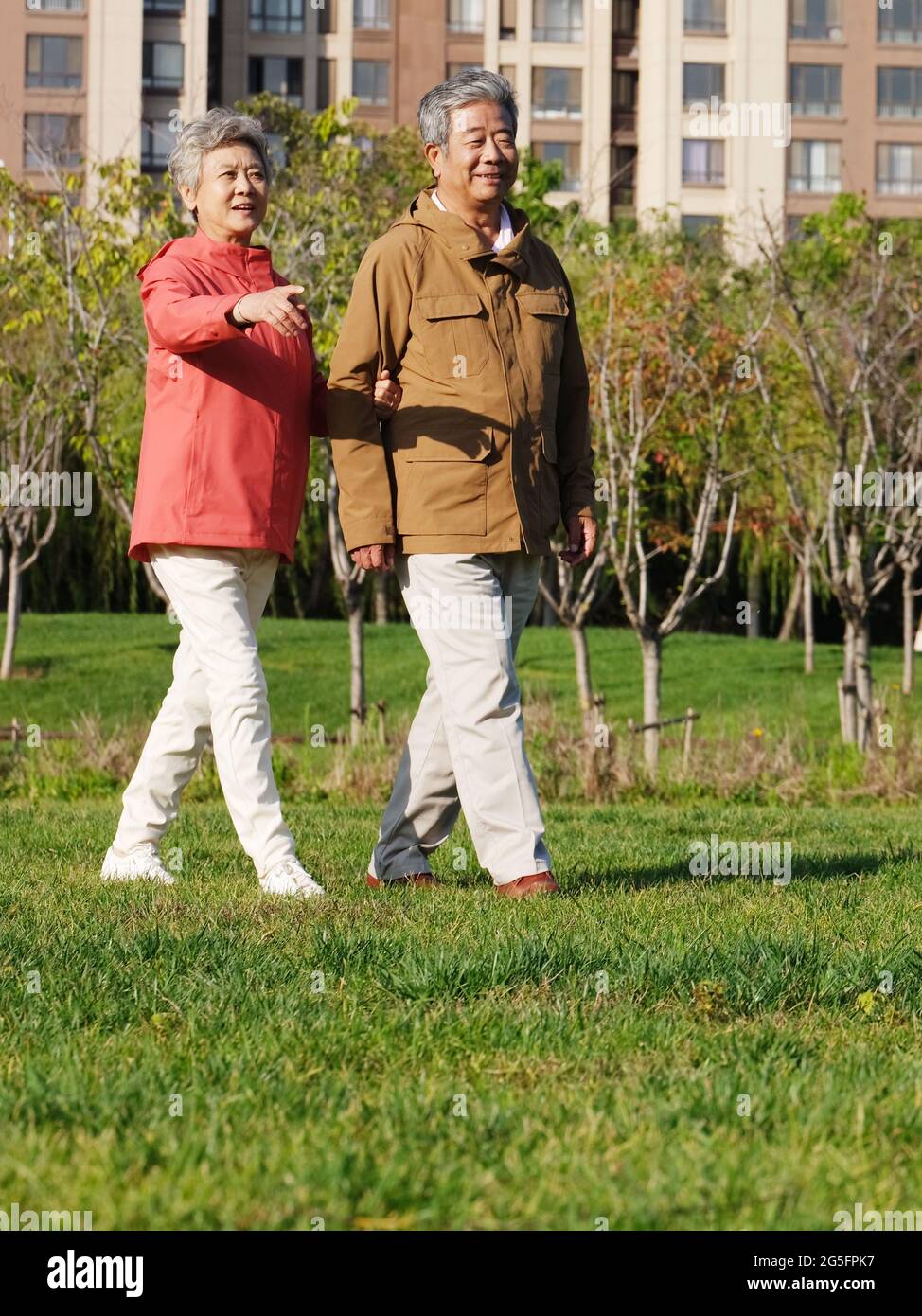 Happy old couple walking in the park high quality photo Stock Photo - Alamy