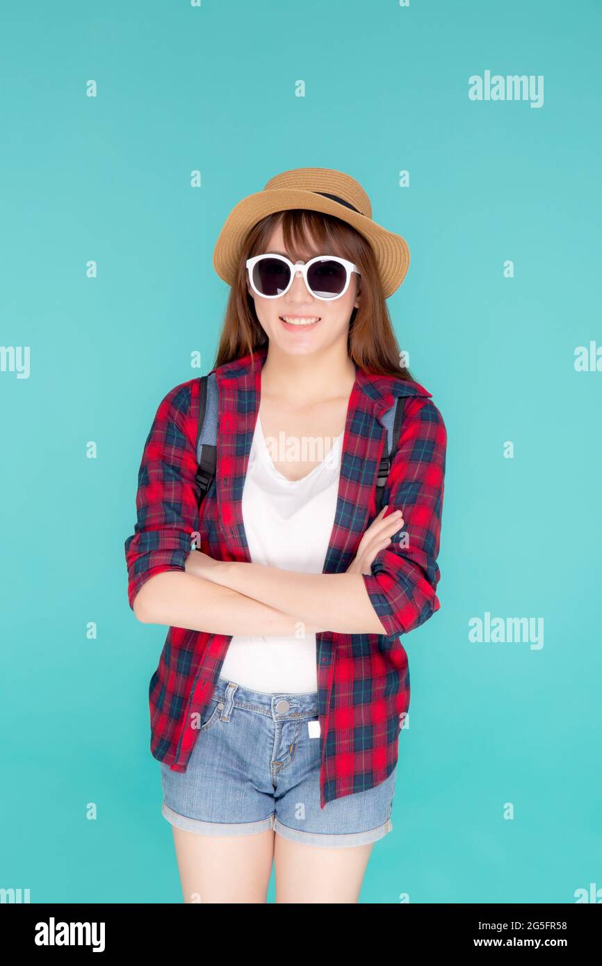 Beautiful portrait young asian woman wear sunglasses and hat smile ...