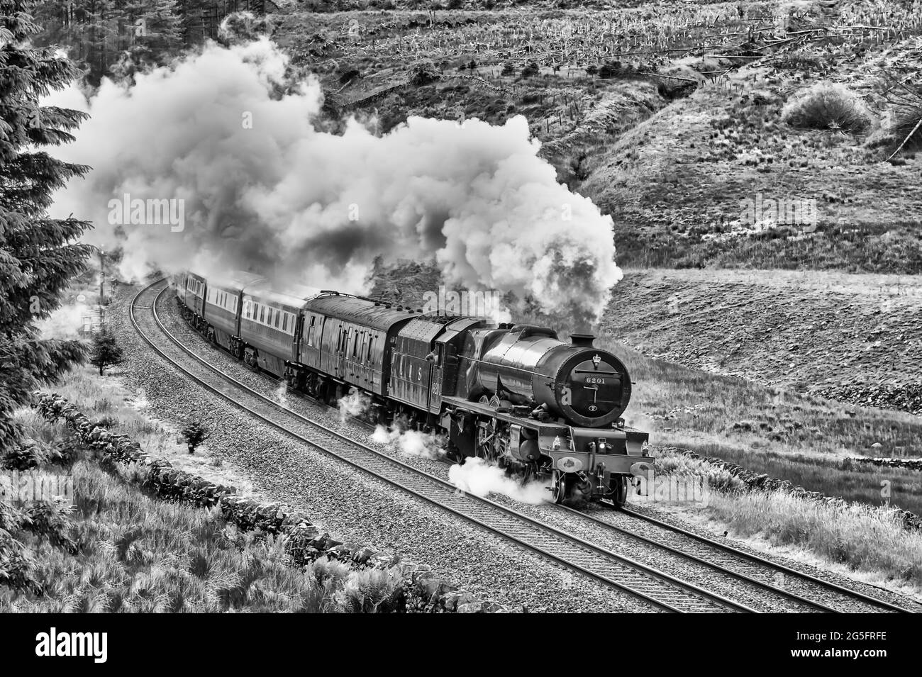 This is the LMS 4-6-2 Princess Royal Class Princess Elizabeth 6201, steam train exiting the Blea Moor tunnel tunnel on the Settle to Carlisle line Stock Photo