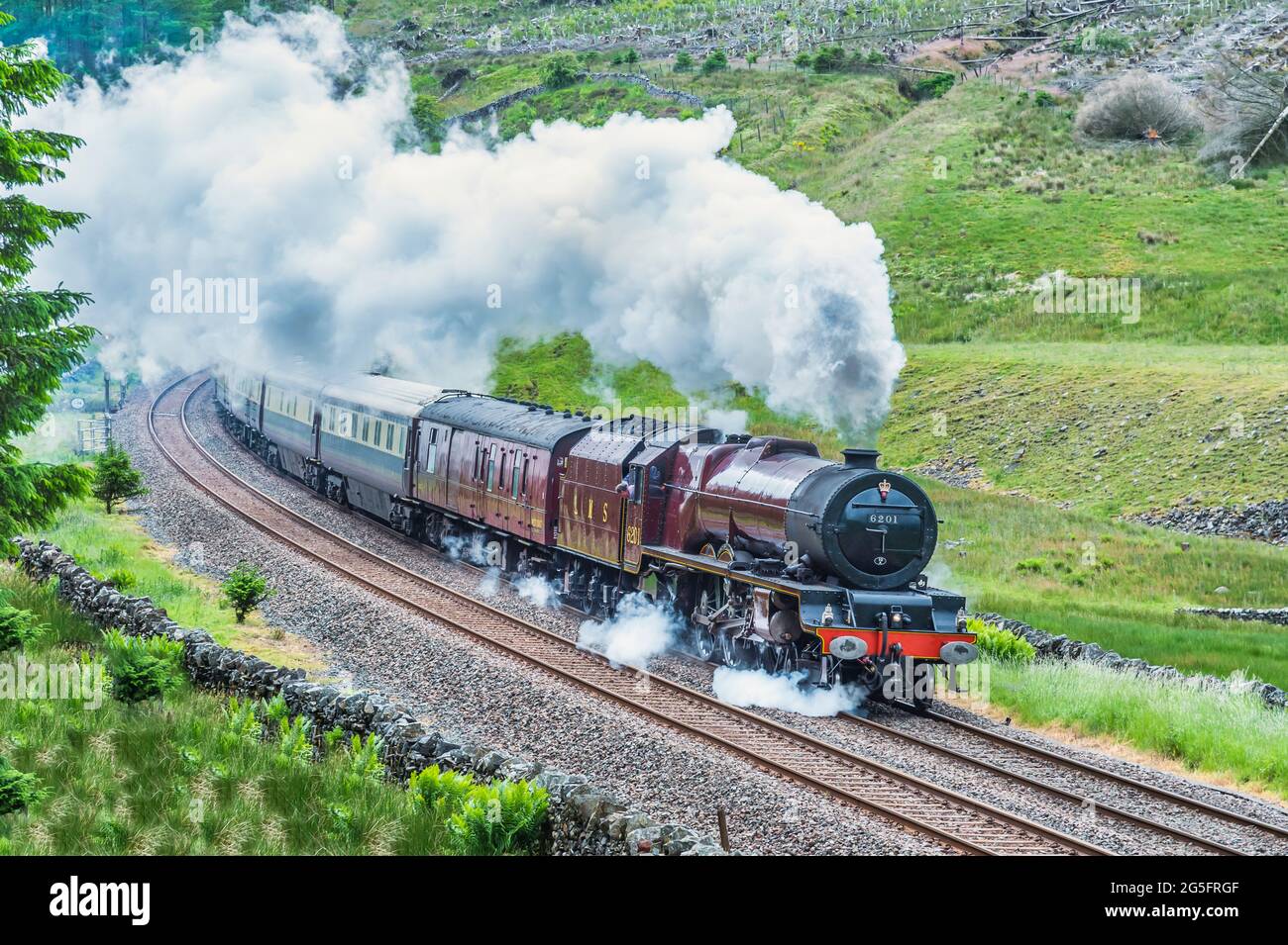 This is the LMS 4-6-2 Princess Royal Class Princess Elizabeth 6201, steam train exiting the Blea Moor tunnel tunnel on the Settle to Carlisle line Stock Photo