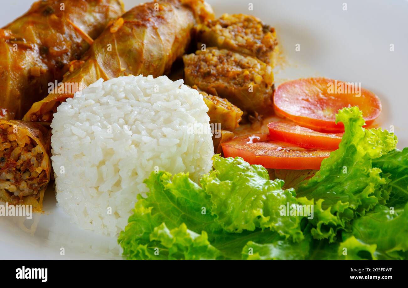 Arabic food. Appetizing cabbage rolls with rice and ground beef Stock
