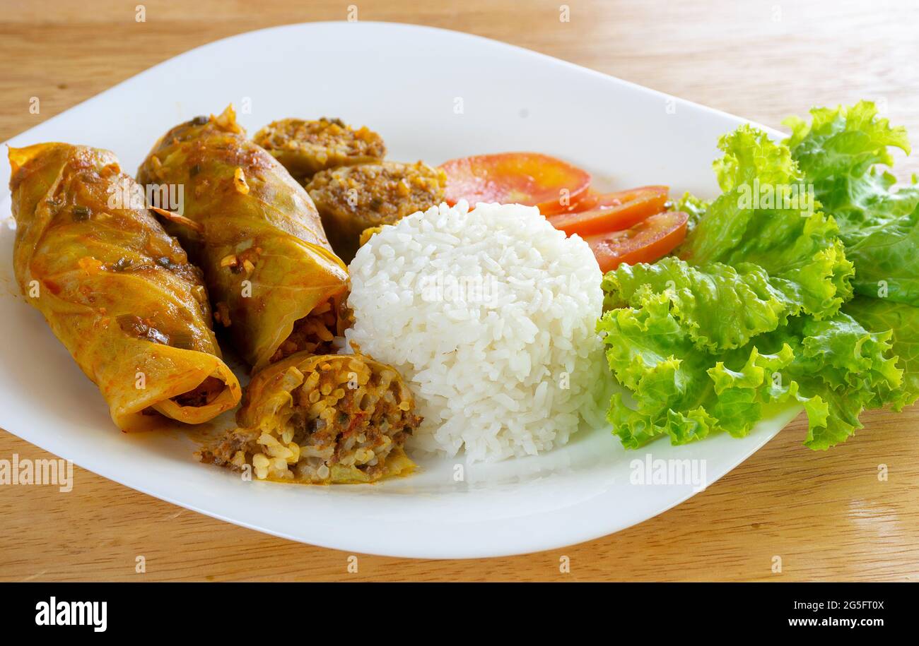 Arabic food. Appetizing cabbage rolls with rice and ground beef Stock