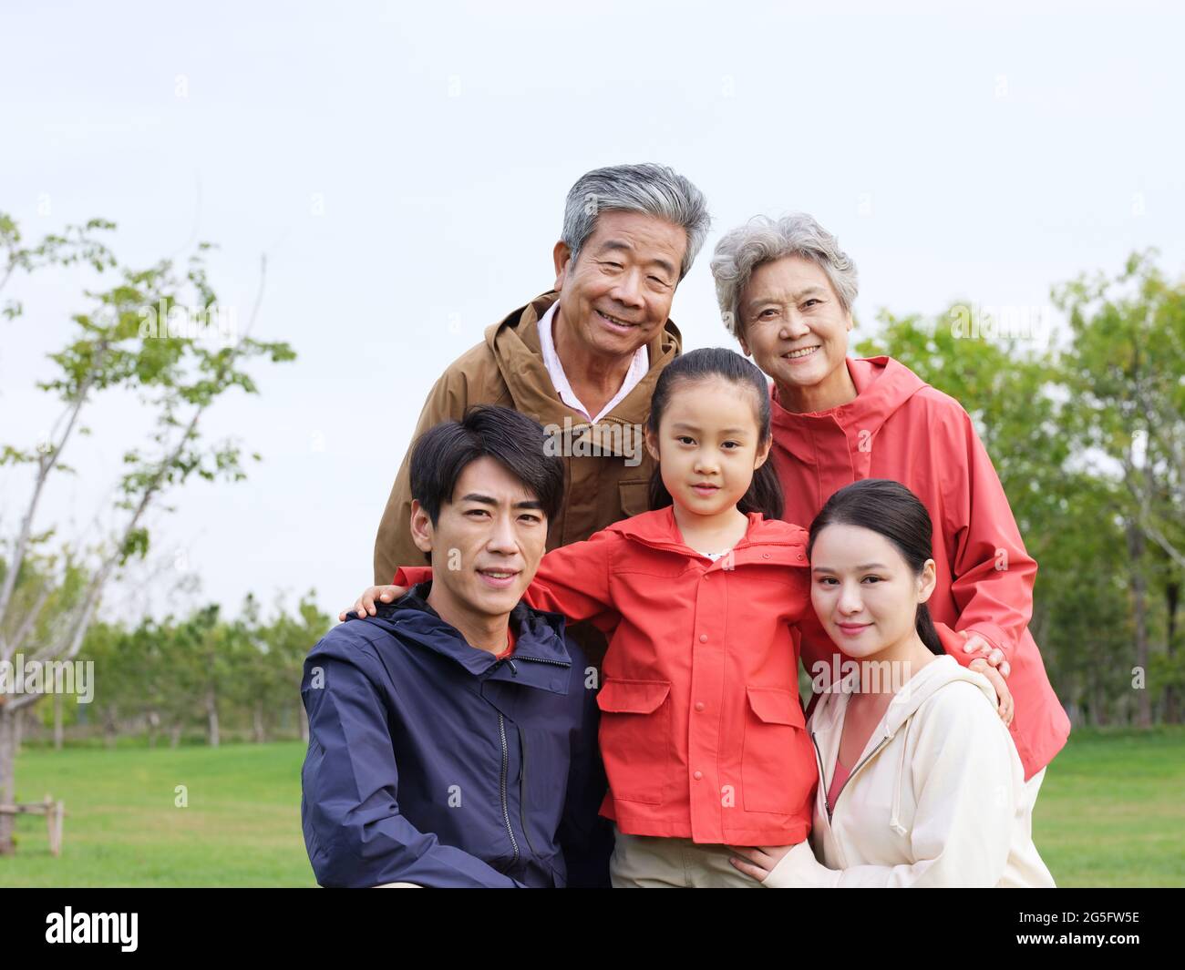 Happy family of five in the park high quality photo Stock Photo