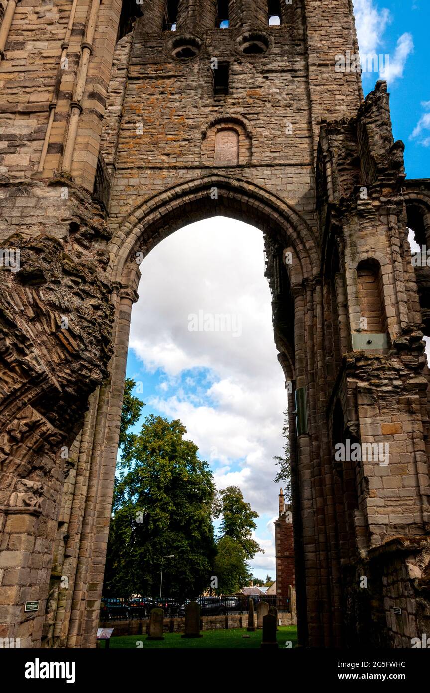 The incredibly high arched entrance to the west tower crossing at Kelso Abbey built in 1128  showing detailed carvings and rich embellishments around Stock Photo