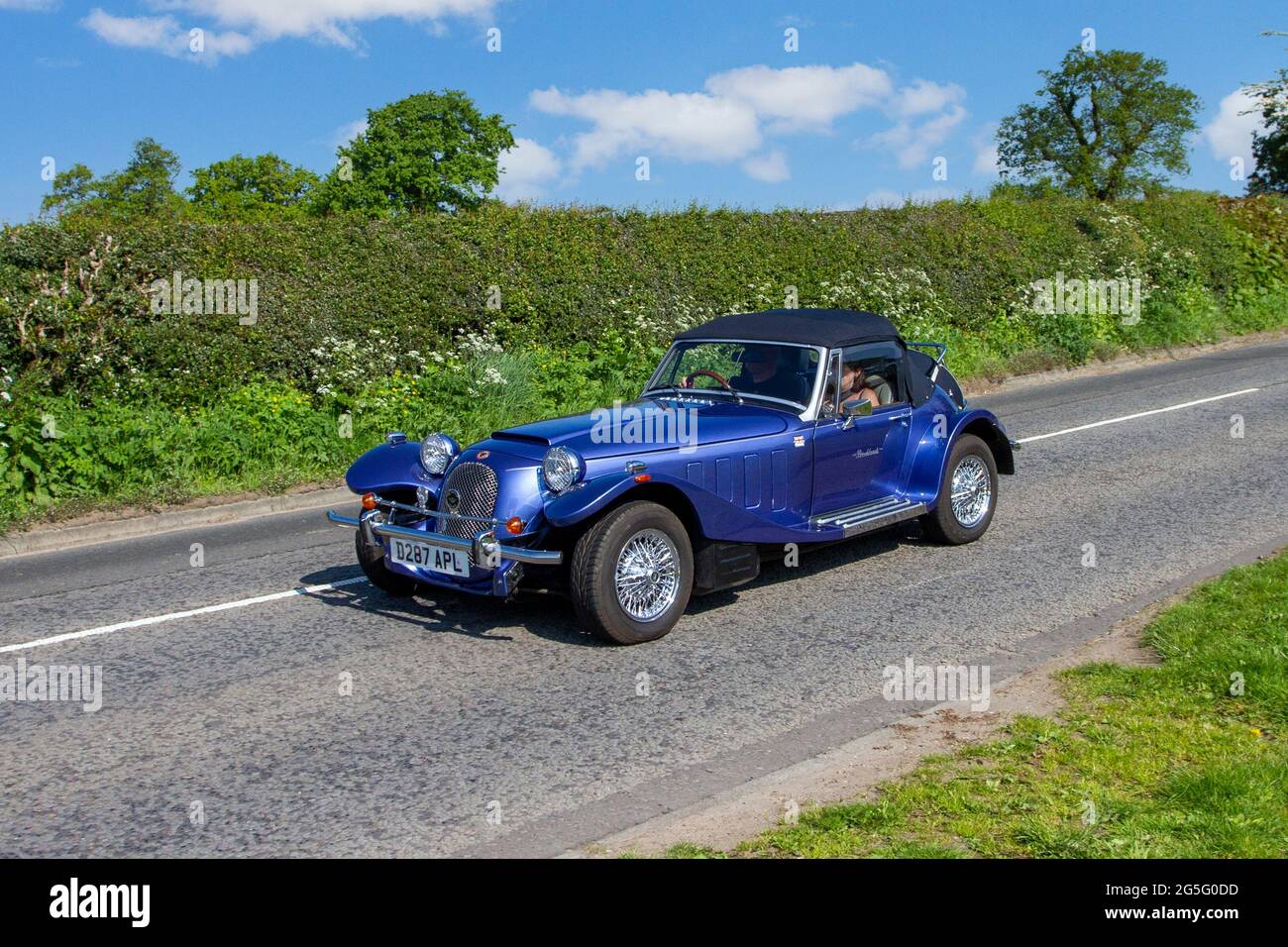 1987 80s eighties Panther blue Kallista 2792cc petrol roadster en-route to Capesthorne Hall classic May car show, Cheshire, UK Stock Photo