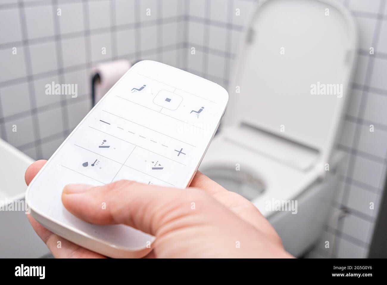 remote Control with buttons of the smart toilet bowl. high technology