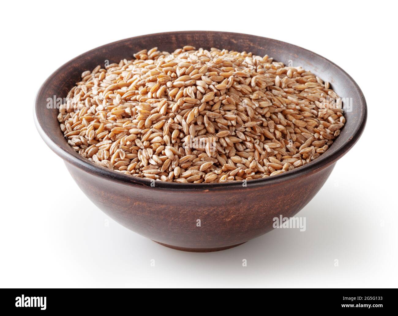 Grains of spelt in ceramic bowl isolated on white background wiht ...