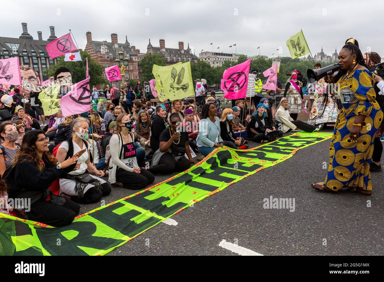 London, UK. 27th June, 2021. June 27, 2021 in London, England: Extinction Rebellion activists march at Southbank during a Free the Press protest. The Climate Change action group rally against the perceived control of the UK Media by just four powerful billionaires. (Photo by Dominika Zarzycka/Sipa USA) Credit: Sipa USA/Alamy Live News Stock Photo