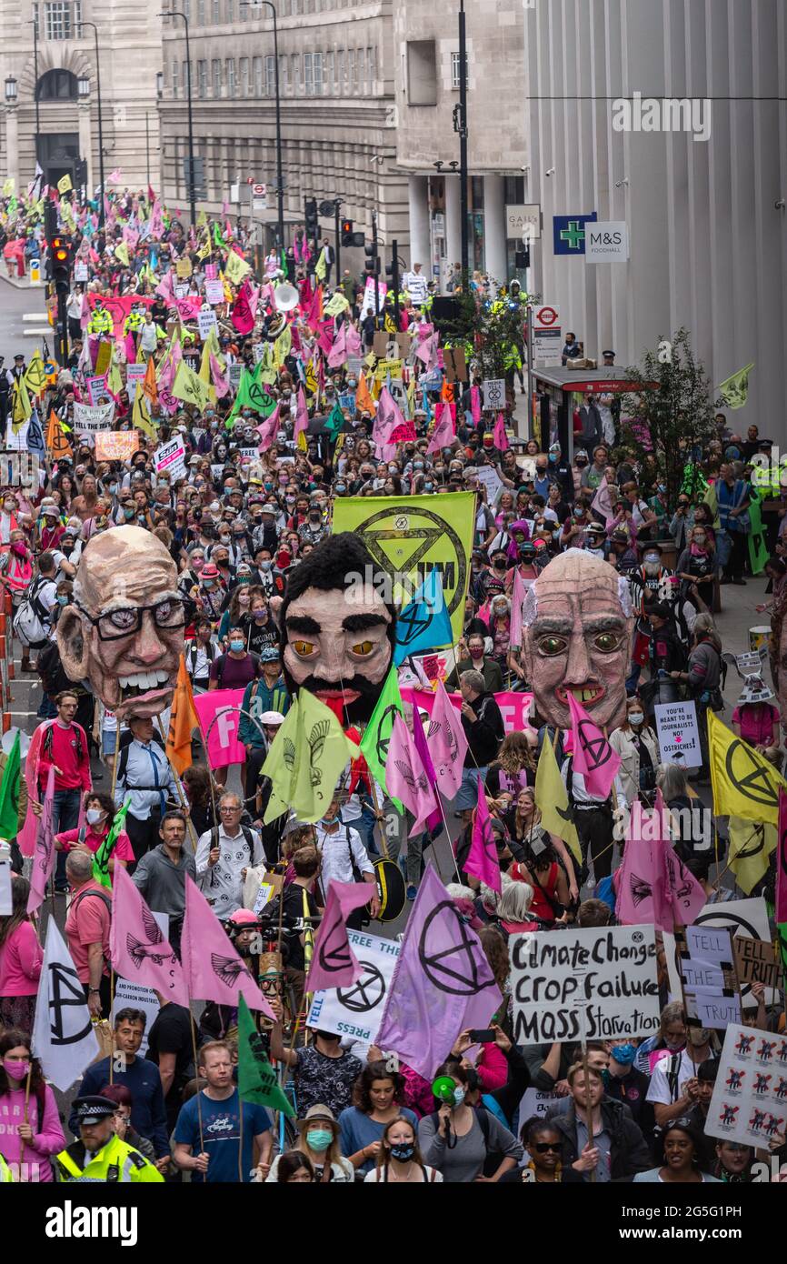 London, UK. 27th June, 2021. June 27, 2021 in London, England: Extinction Rebellion activists march at Southbank during a Free the Press protest. The Climate Change action group rally against the perceived control of the UK Media by just four powerful billionaires. (Photo by Dominika Zarzycka/Sipa USA) Credit: Sipa USA/Alamy Live News Stock Photo