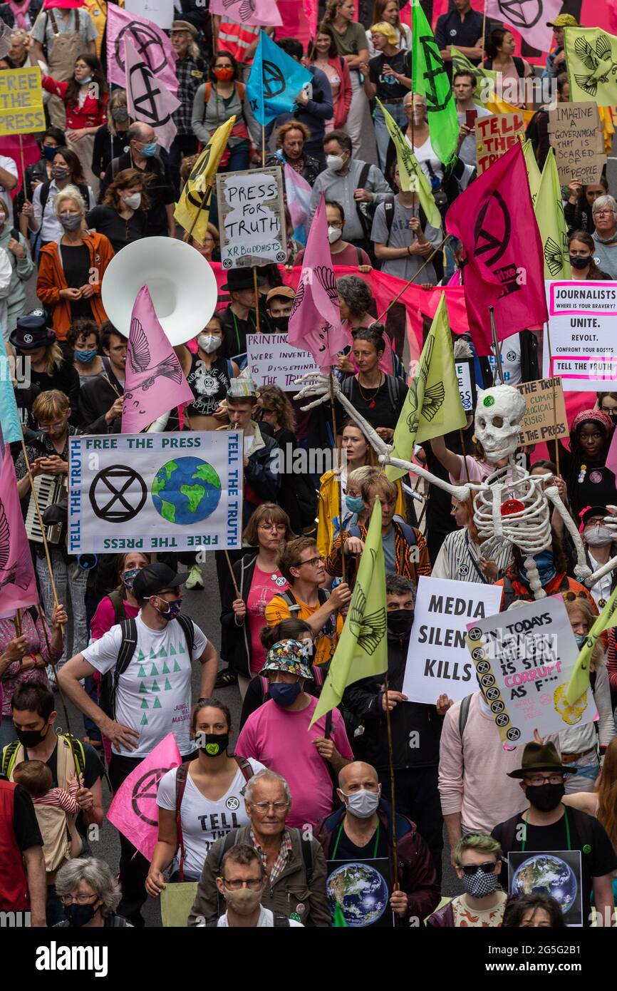 London, UK. 27th June, 2021. June 27, 2021 in London, England: Extinction Rebellion activists march at Southbank during a Free the Press protest. The Climate Change action group rally against the perceived control of the UK Media by just four powerful billionaires. (Photo by Dominika Zarzycka/Sipa USA) Credit: Sipa USA/Alamy Live News Stock Photo