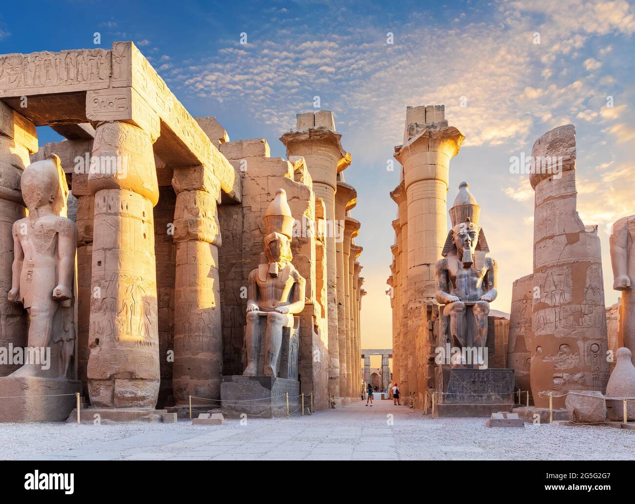 Luxor Temple courtyard and the statues of Ramses II, Egypt Stock Photo ...