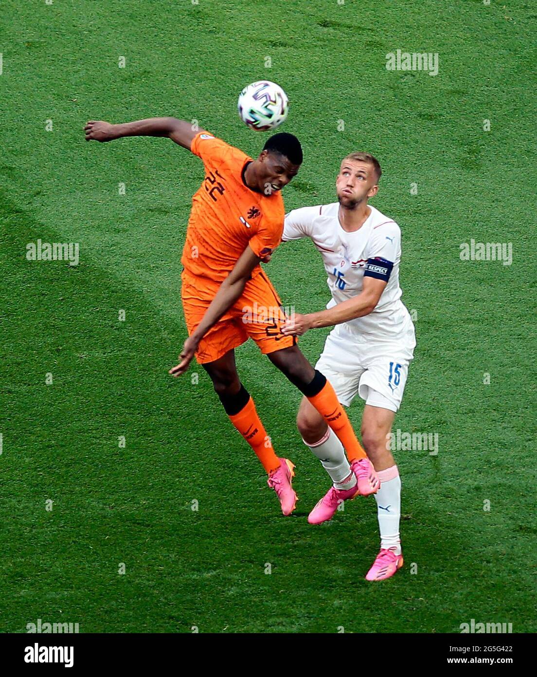 Netherlands's Denzel Dumfries and Czech Republic's Tomas Soucek (right) battle for the ball during the UEFA Euro 2020 round of 16 match held at the Puskas Arena in Budapest, Hungary. Picture date: Sunday June 27, 2021. Stock Photo