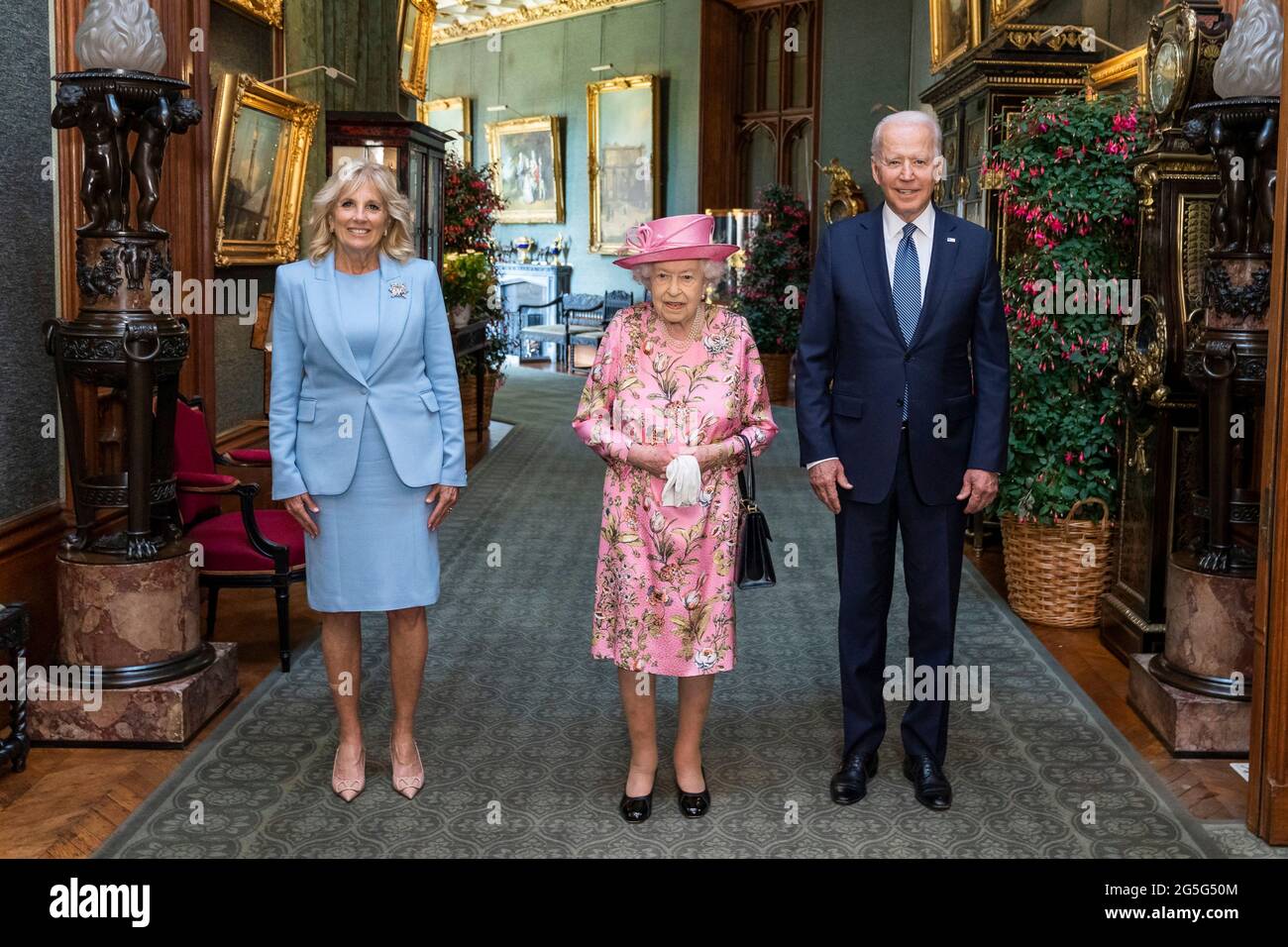U.S President Joe Biden and First Lady Jill Biden pose for an official photo with Queen Elizabeth II in the Grand Corridor of Windsor Castle June 13, 2021 in Windsor, England, United Kingdom. Stock Photo