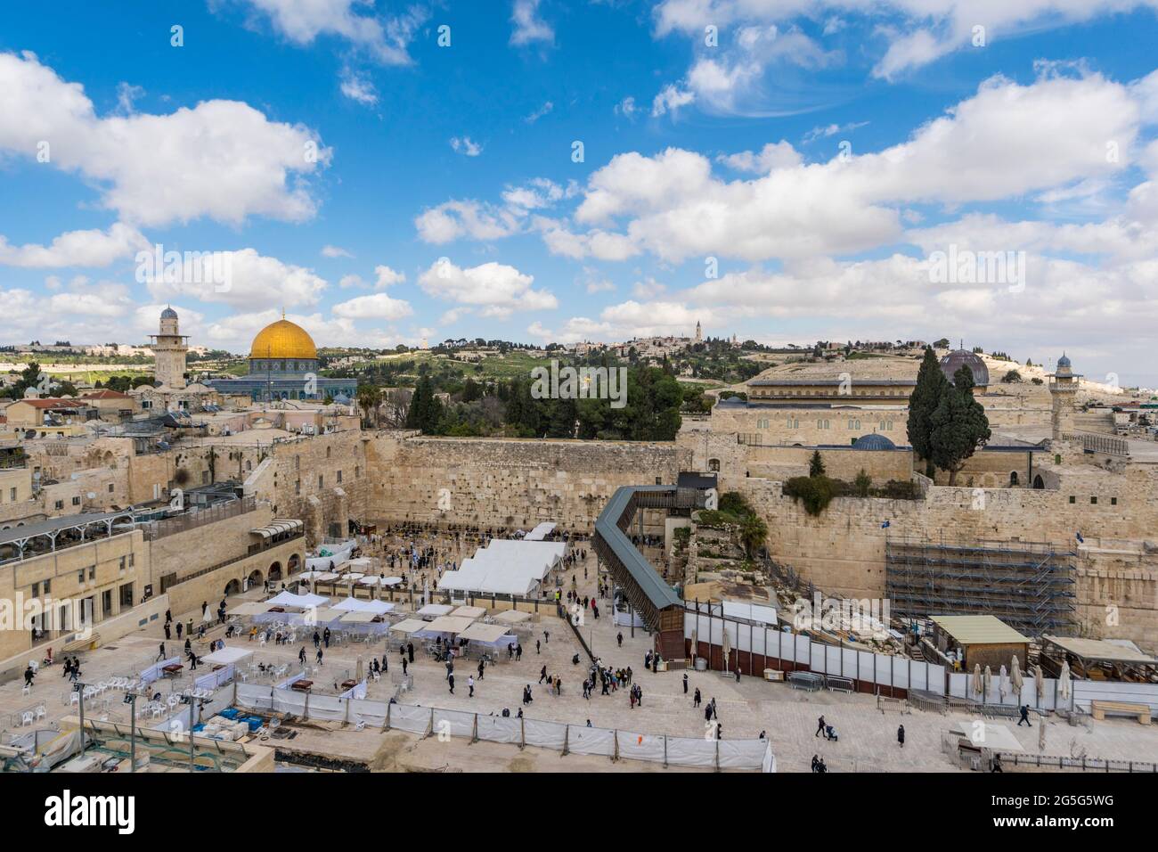 Jerusalem, Israel. The Western Wall, one of the holliest places for Judaism, also known as the 'Wailling wall', was equipped with barriers and dividers to seperate people praying during the Covid-19 pandemic. Stock Photo