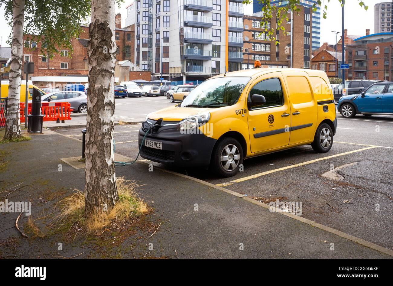 Leicester City Council electric powered van charging up in a car park