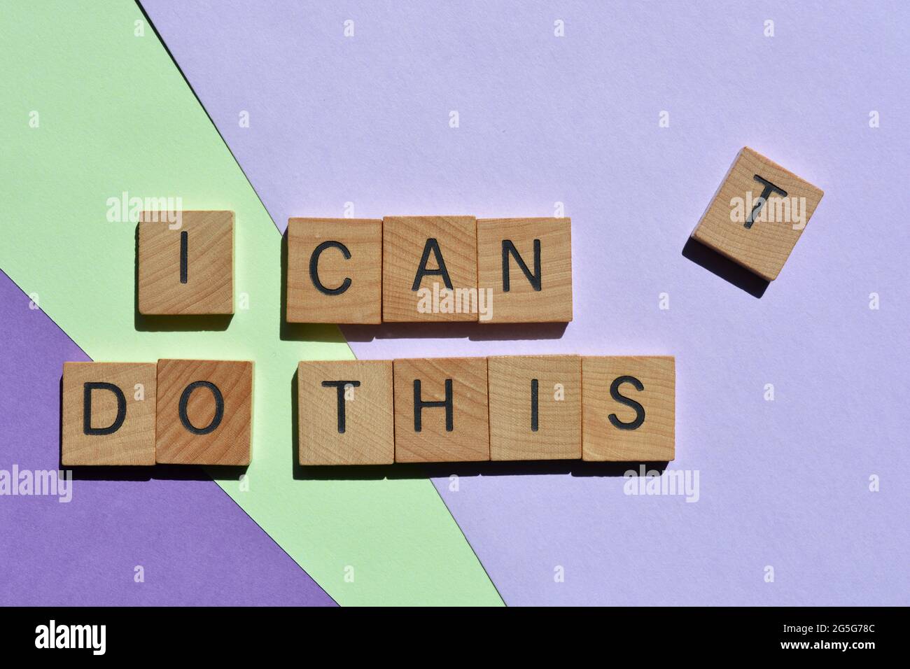 I Can / Can't Do This, motivational words in wooden alphabet letters Stock Photo