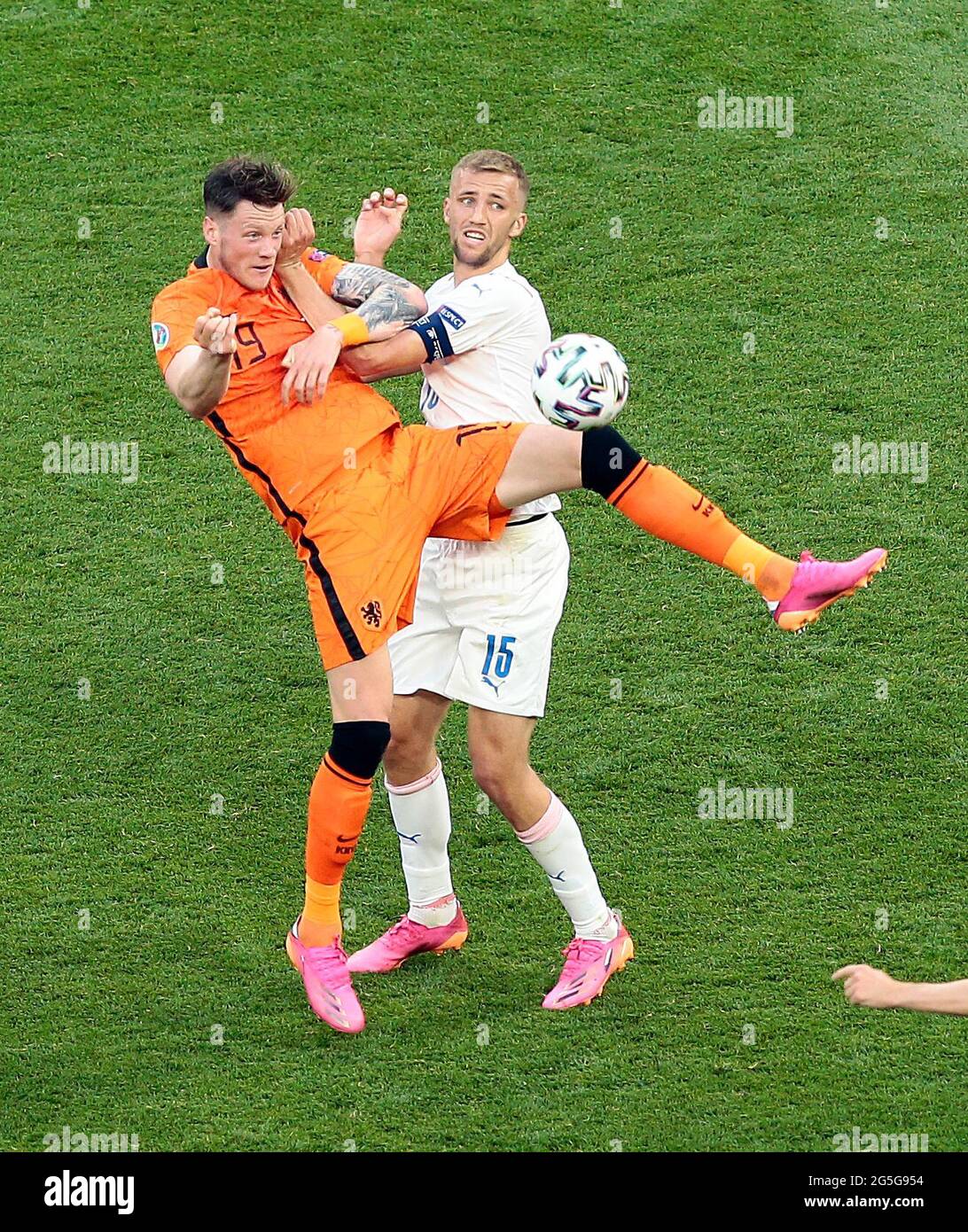 Netherlands's Wout Weghorst and Czech Republic's Tomas Soucek battle for the ball during the UEFA Euro 2020 round of 16 match held at the Puskas Arena in Budapest, Hungary. Picture date: Sunday June 27, 2021. Stock Photo