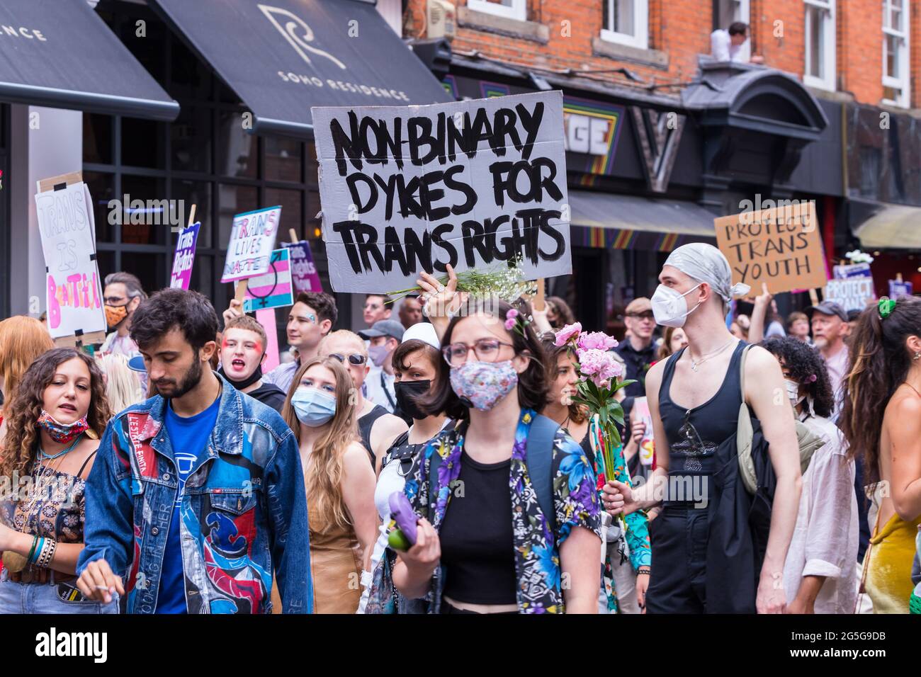 Lesbians holding placards showing support to trans people at the third edition of London Trans Pride Stock Photo