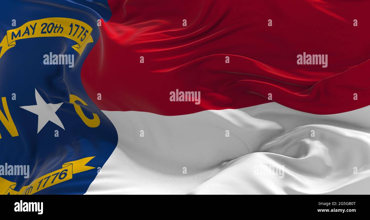 flag of North Carolina waving in the wind. Patriotic concept about ...