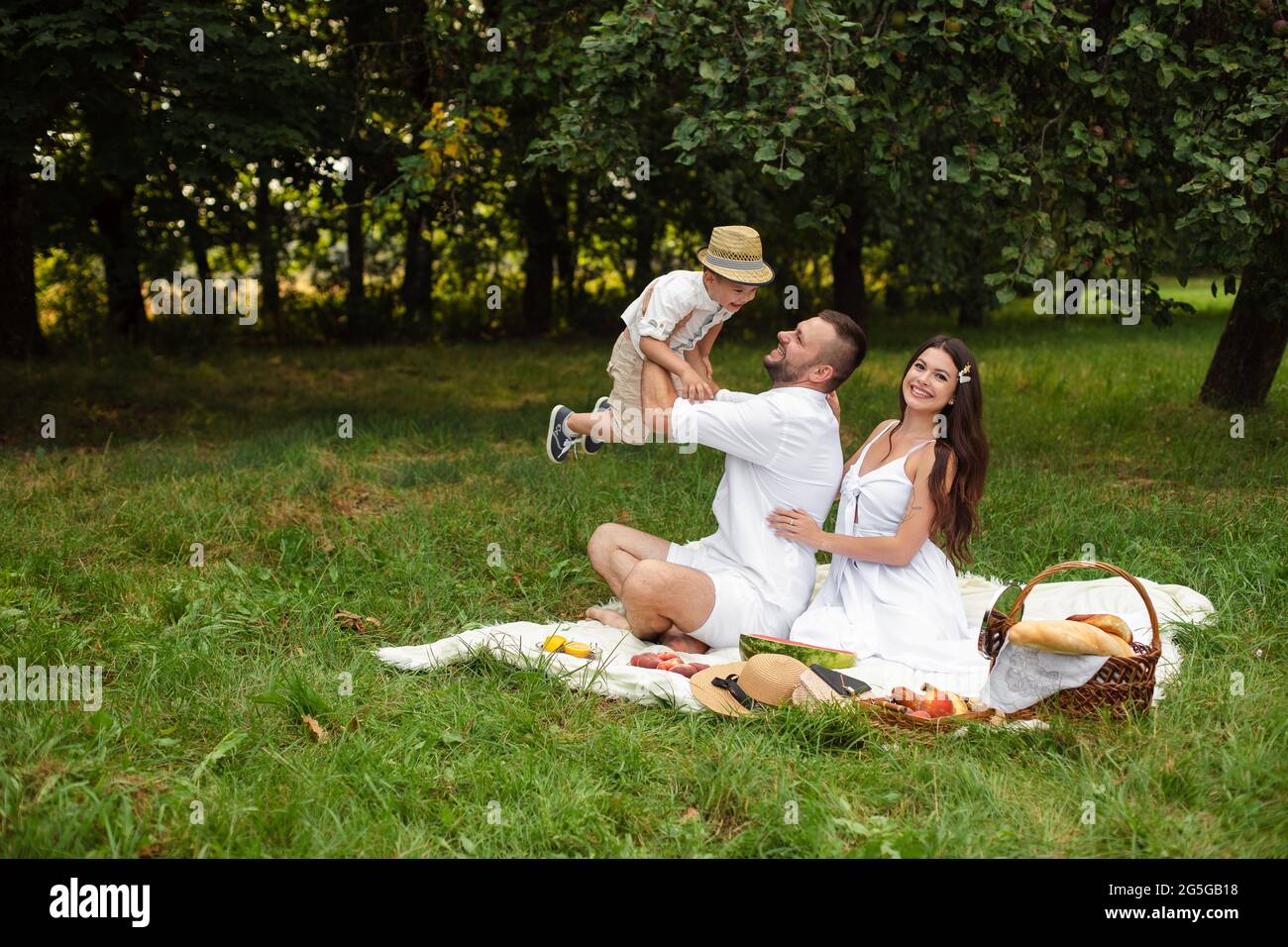 Loving parents son picnic hi-res stock photography and images - Alamy