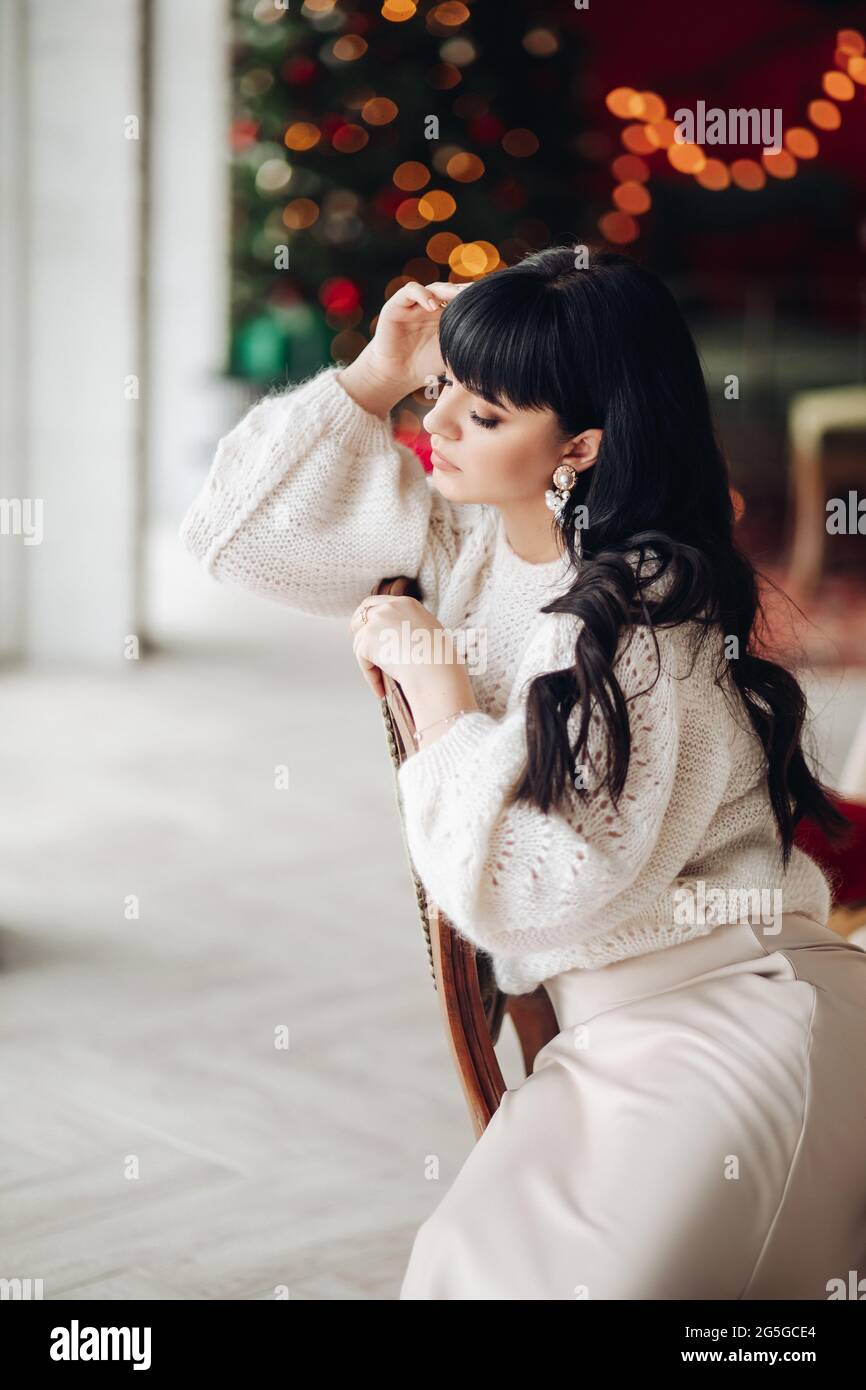 Attractive elegant woman sitting hi-res stock photography and images ...