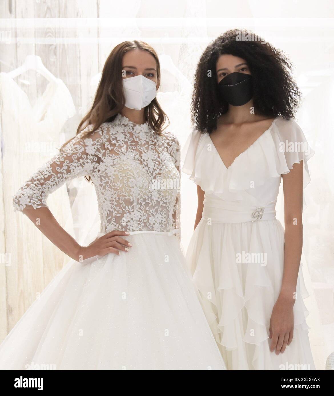 Milan, Italy. 27th June, 2021. Milano, Italy Yes SPOSAITALIA Collezioni 2021 Milano Brindal Week Fieramilano City presentation of wedding dresses and ceremony In the photo: presentations of women's wedding dresses Credit: Independent Photo Agency/Alamy Live News Stock Photo