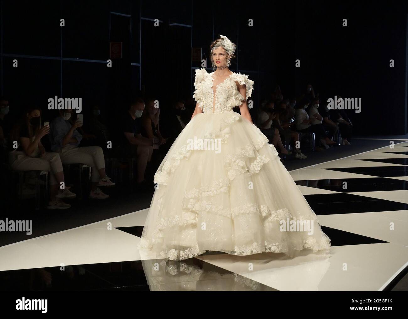 Milan, Italy. 27th June, 2021. Milano, Italy Yes SPOSAITALIA Collezioni 2021 Milano Brindal Week Fieramilano City presentation of wedding dresses and ceremony In the photo: presentations of women's wedding dresses Credit: Independent Photo Agency/Alamy Live News Stock Photo