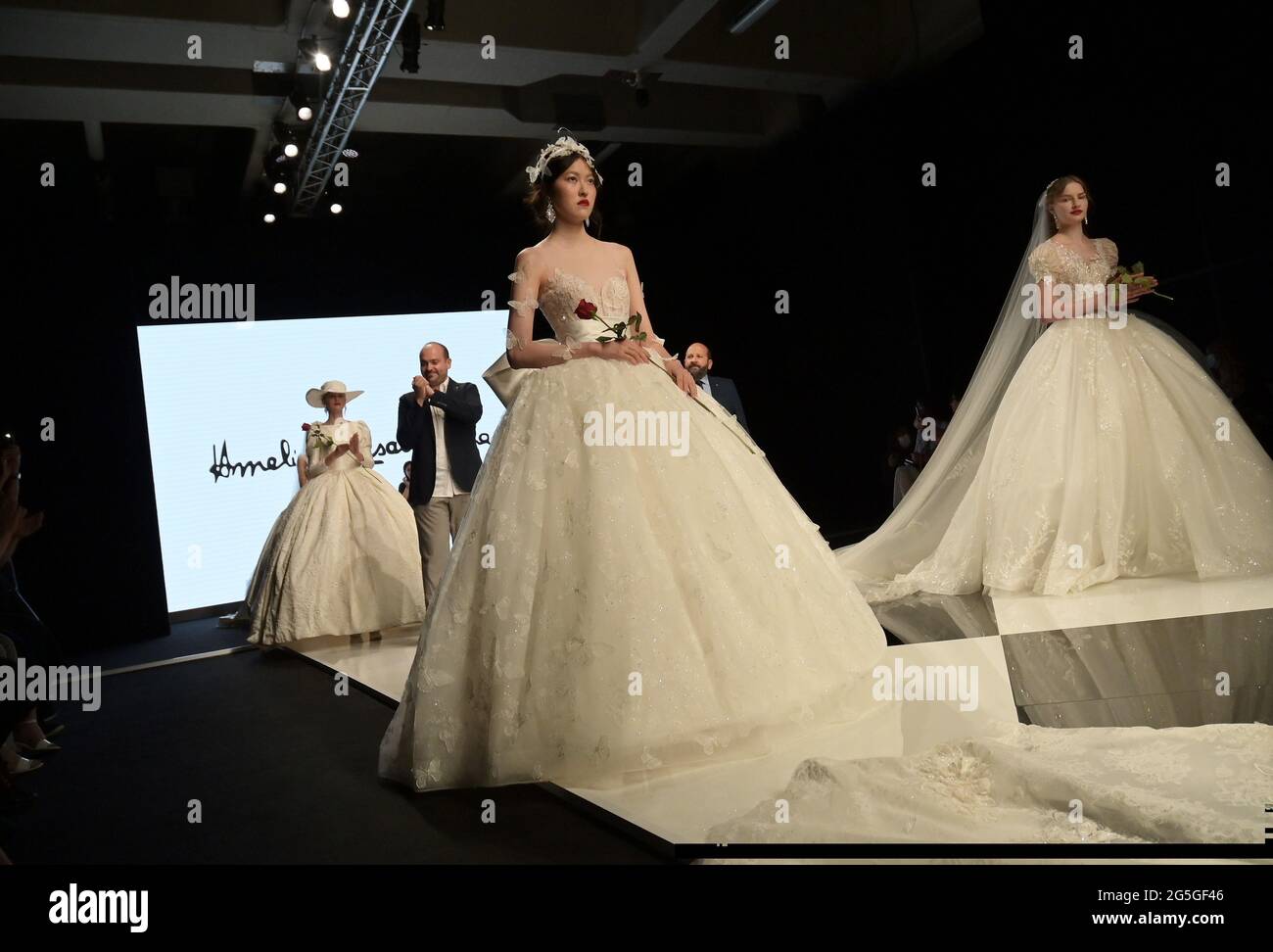 Milan, Italy. 27th June, 2021. Milano, Italy Yes SPOSAITALIA Collezioni 2021 Milano Brindal Week Fieramilano City presentation of wedding dresses and ceremony In the photo: presentations of women's wedding dresses Credit: Independent Photo Agency/Alamy Live News Stock Photo