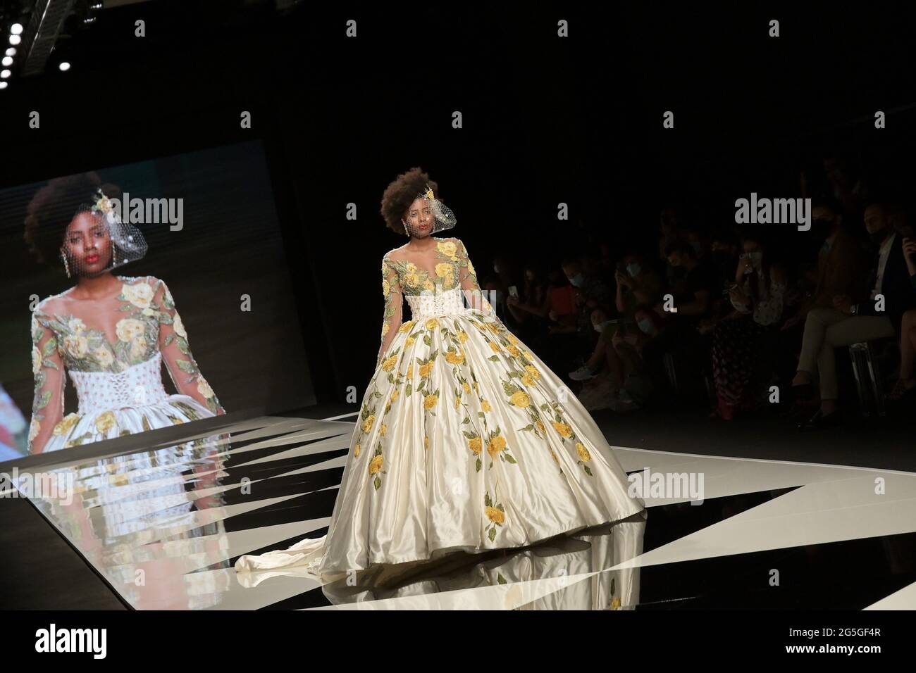 Milan, Italy. 27th June, 2021. Milano, Italy Yes SPOSAITALIA Collezioni 2021 Milano Brindal Week Fieramilano City presentation of wedding dresses and ceremony In the photo: presentations of women's wedding dresses Credit: Independent Photo Agency/Alamy Live News Stock Photo