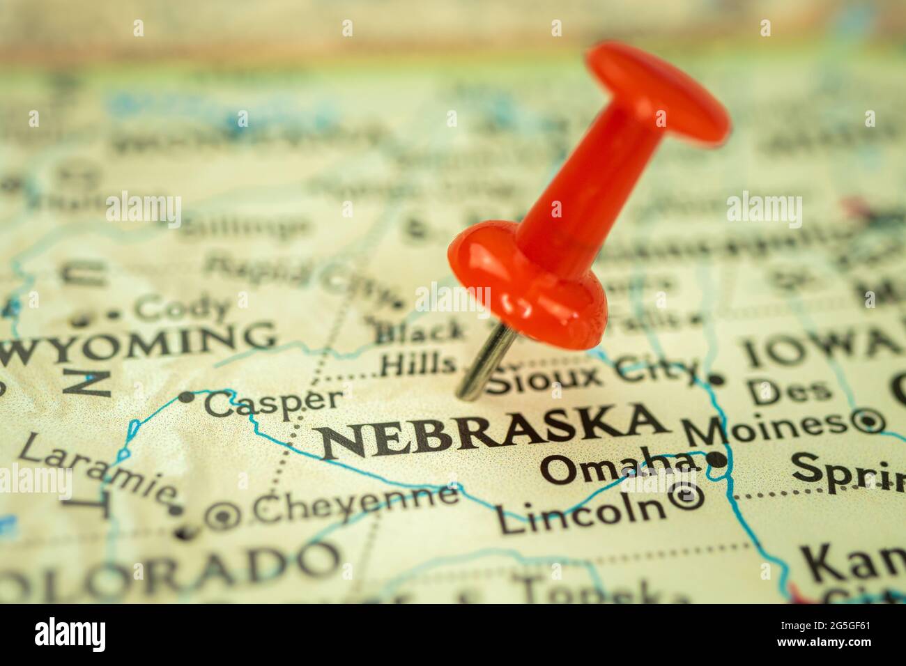 Location Nebraska state, map with red push pin pointing close up, USA