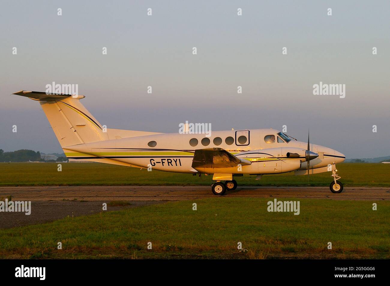 London Executive Aviation Beechcraft Super King Air 200 plane G-FRYI on a misty dawn at London Southend Airport, UK Stock Photo
