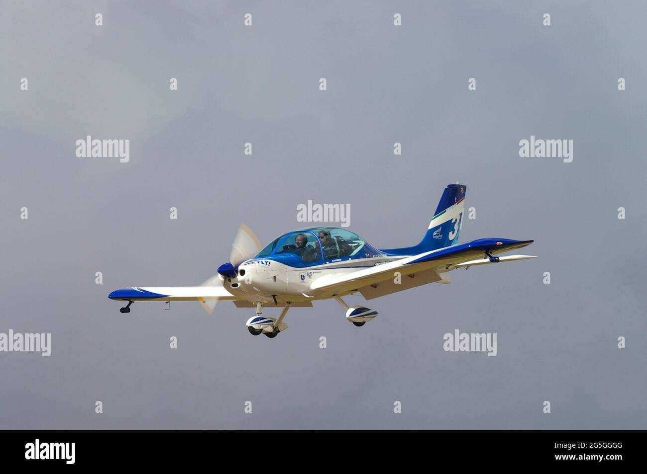 i dag tigger Tick WeFly! Team, civilian aerobatic team from Italy with disabled pilots flying  Fly Synthesis Texan planes, an Italian ultralight and light-sport aircraft  Stock Photo - Alamy