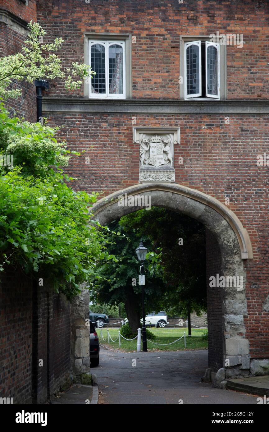 The Tudor gatehouse of Richmond Palace with Henry VIII's coat of arms, Richmond upon Thames, Surrey, UK Stock Photo