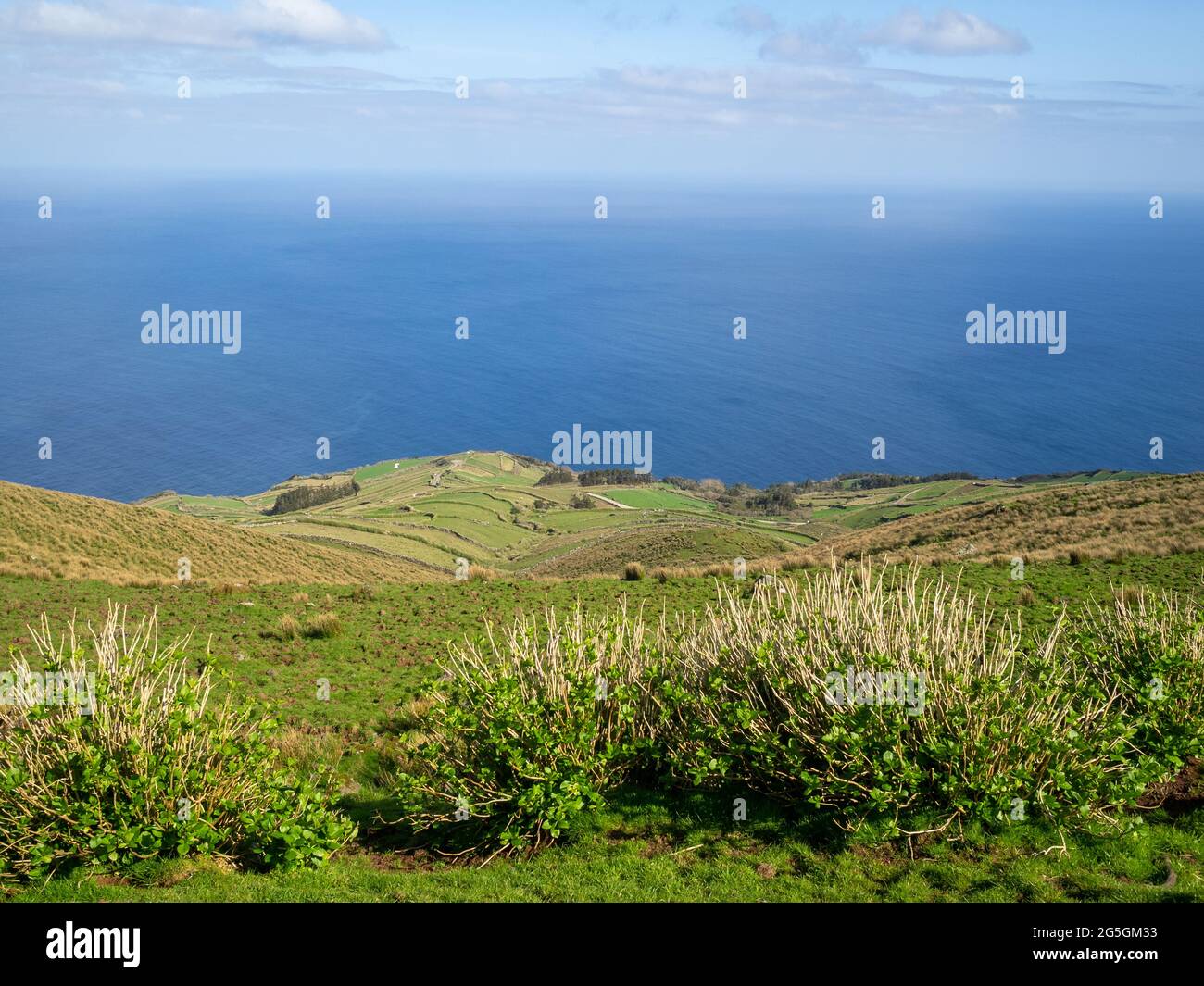 View down the volcanic crater slop and to the Atlantic Ocean, Corvo Island Stock Photo