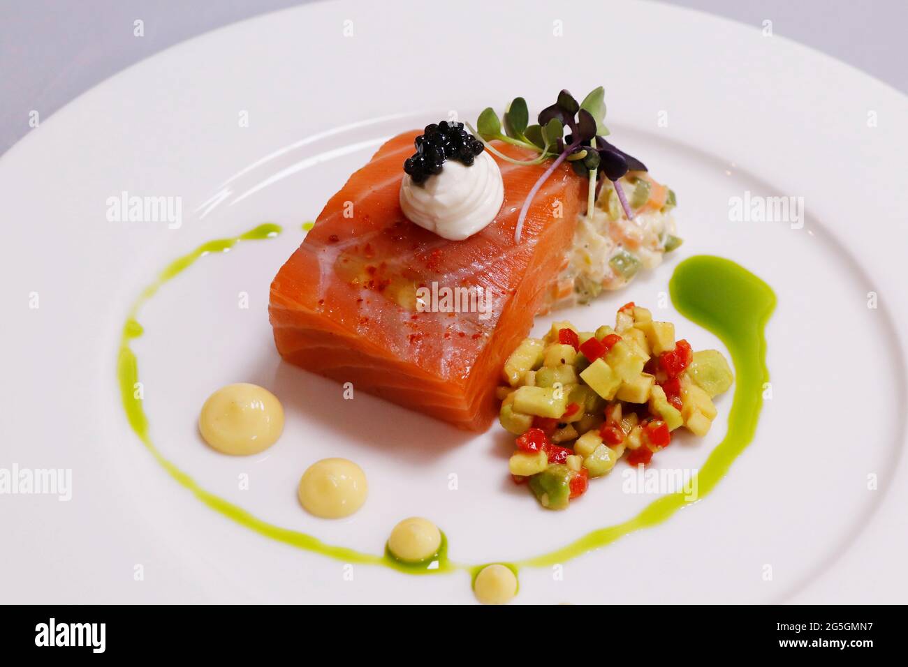 mei cook salmon dish ( slow poached ) with caviar, luxury fine dining food  Stock Photo - Alamy