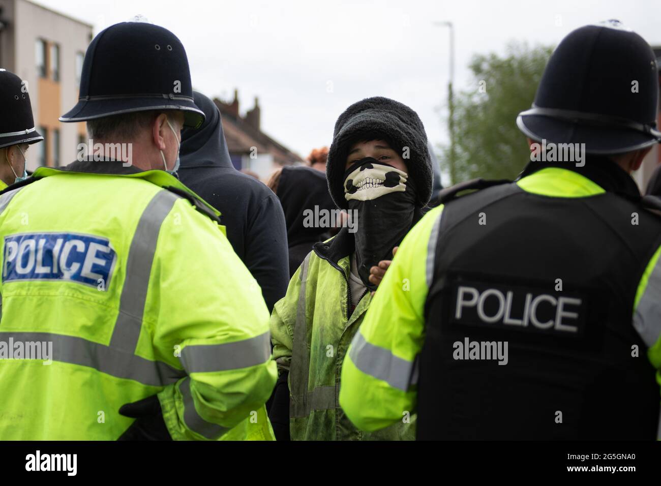Eastville, Bristol, UK. 20th May 2021. Scores of police and bailiffs have surrounded a traveller encampment in Bristol to evict occupiers. Stock Photo