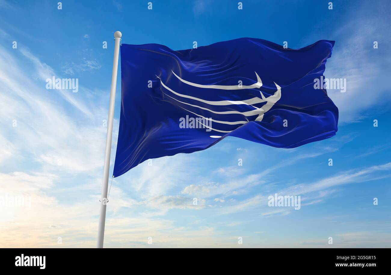 Minsk, Belarus - May, 2021: Flag of Union of South American Nations, UNASUR waving in the wind at flagpole on background of blue sky. 3d illustration. Stock Photo