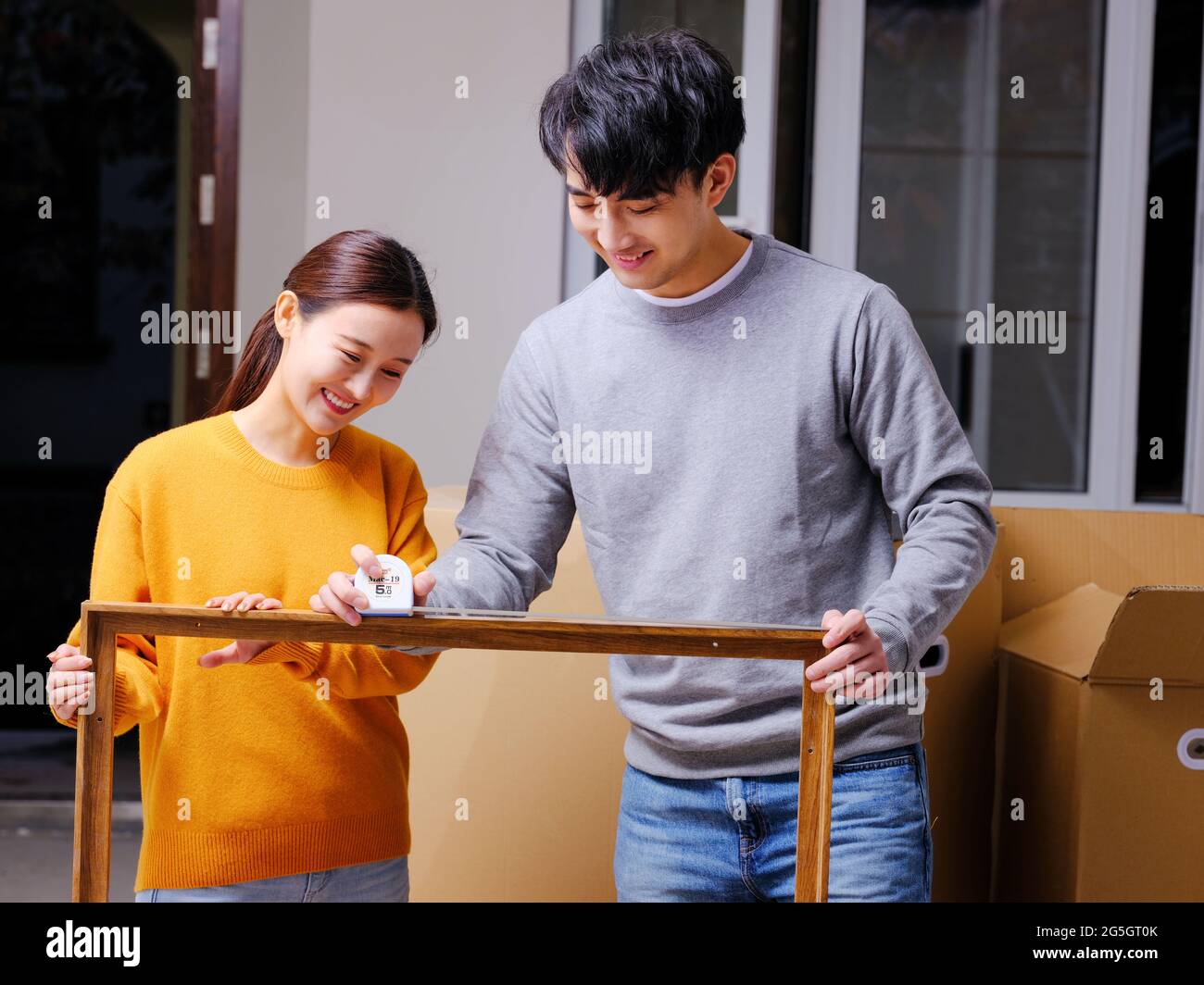 Young couple decorate new home high quality photo Stock Photo