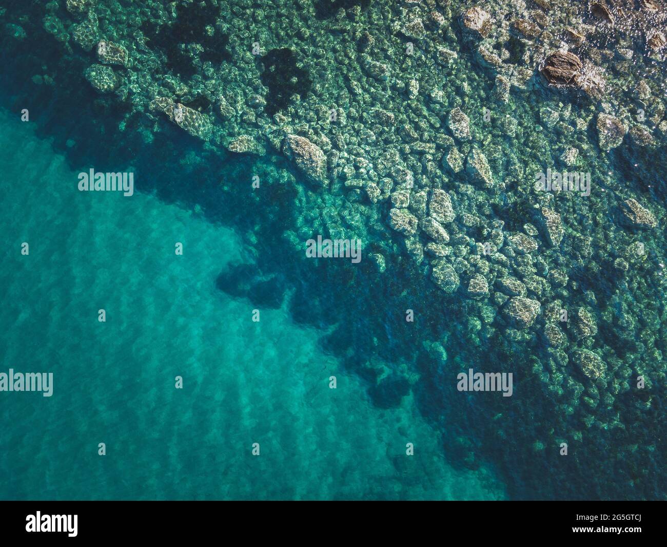 An aerial top view of coral reef and clear water Stock Photo - Alamy
