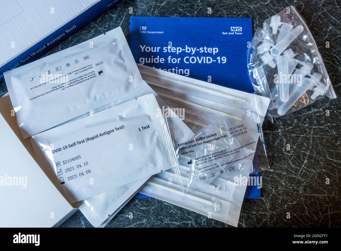 Rapid Lateral Flow Test kit provided by UK NHS Stock Photo Alamy