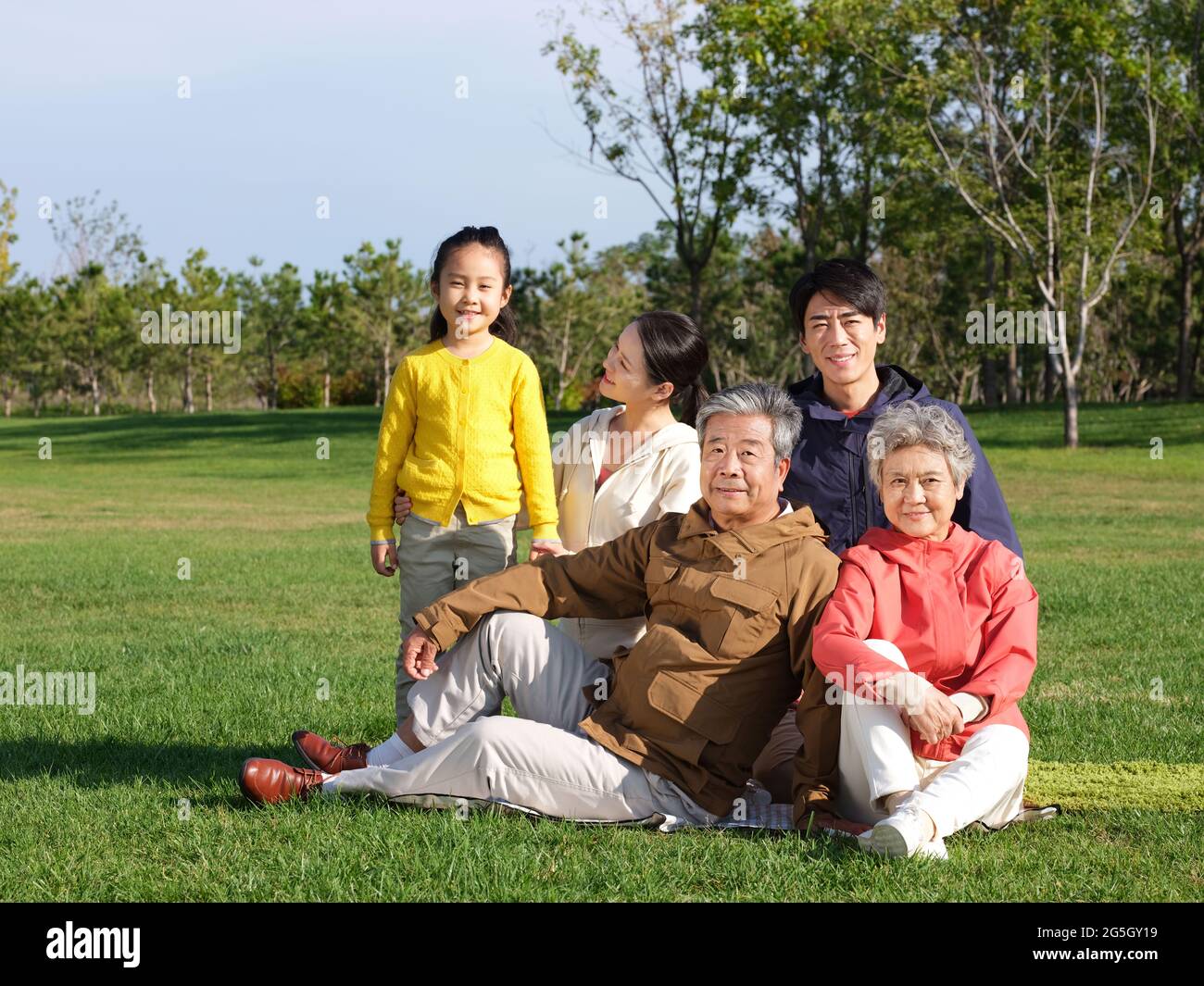 Happy family of five in the park high quality photo Stock Photo