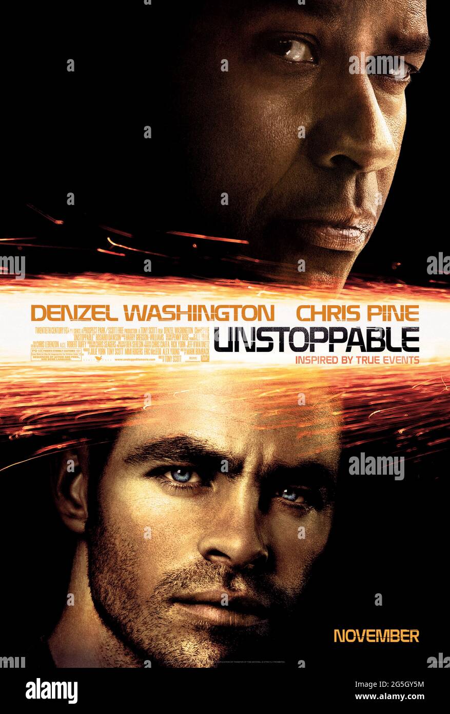 Unstoppable (2010) directed by Tony Scott and starring Denzel Washington, Chris Pine and Rosario Dawson. A veteran engineer and a young conductor race against the clock to prevent disaster when an unmanned freight train carrying toxic chemicals heads towards a city. Stock Photo