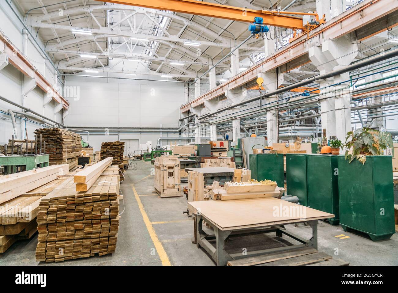 Factory inside interior, Stack of wooden boards in woodworking