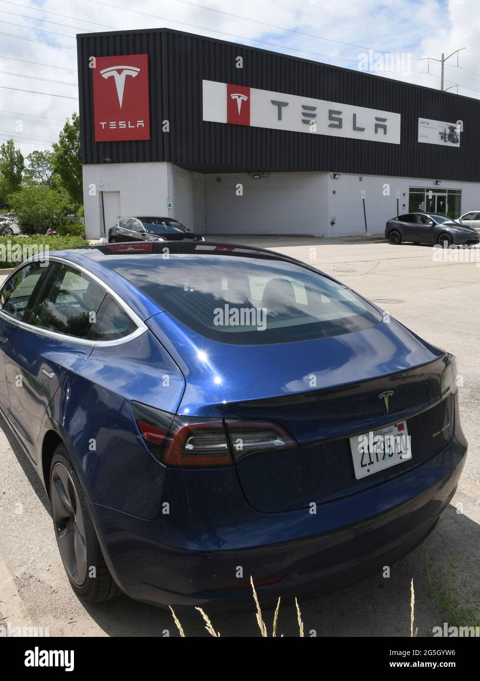 Highland Park, Illinois, USA. 27th June, 2021. A Tesla car dealer in Highland Park, Illinois is