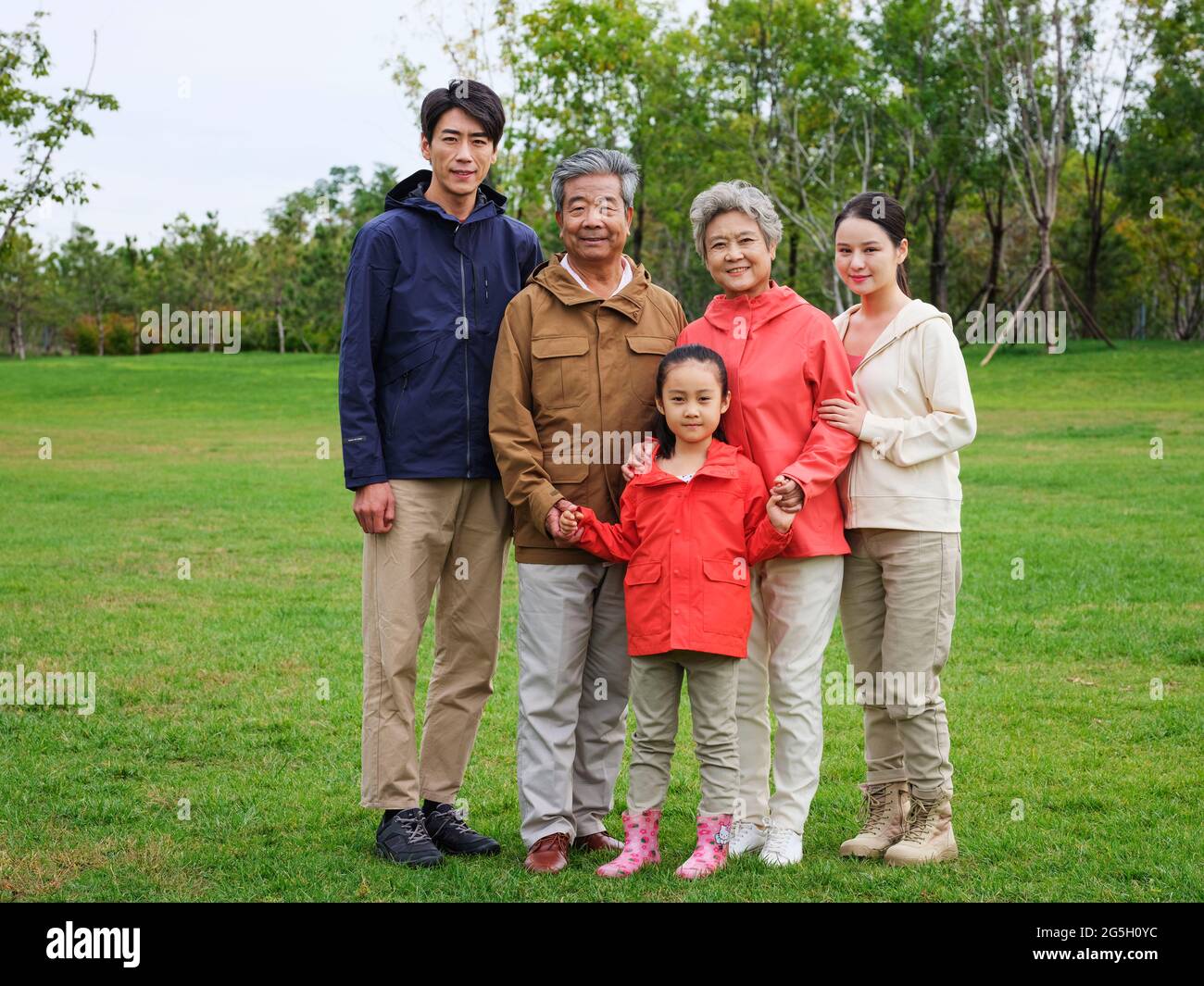 Happy family of five in the park high quality photo Stock Photo