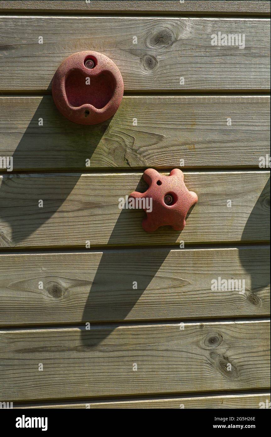 Shape fixed to a wooden background Stock Photo