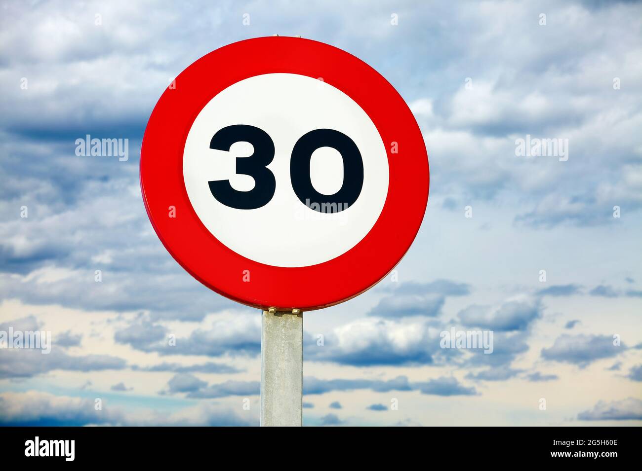 Speed Limit sign for 30 km per hours or mph Stock Photo