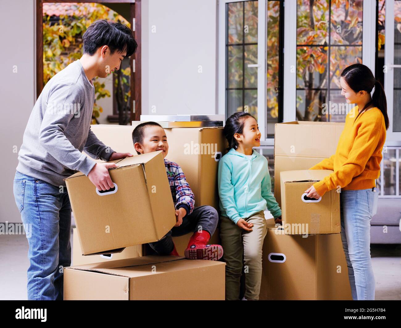 A happy family of four move high quality photo Stock Photo