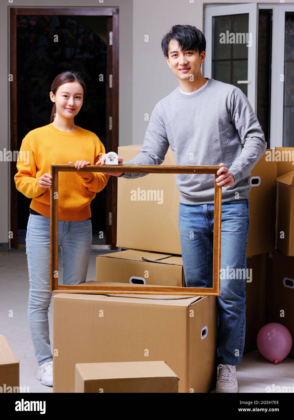 Young couple decorate new home high quality photo Stock Photo