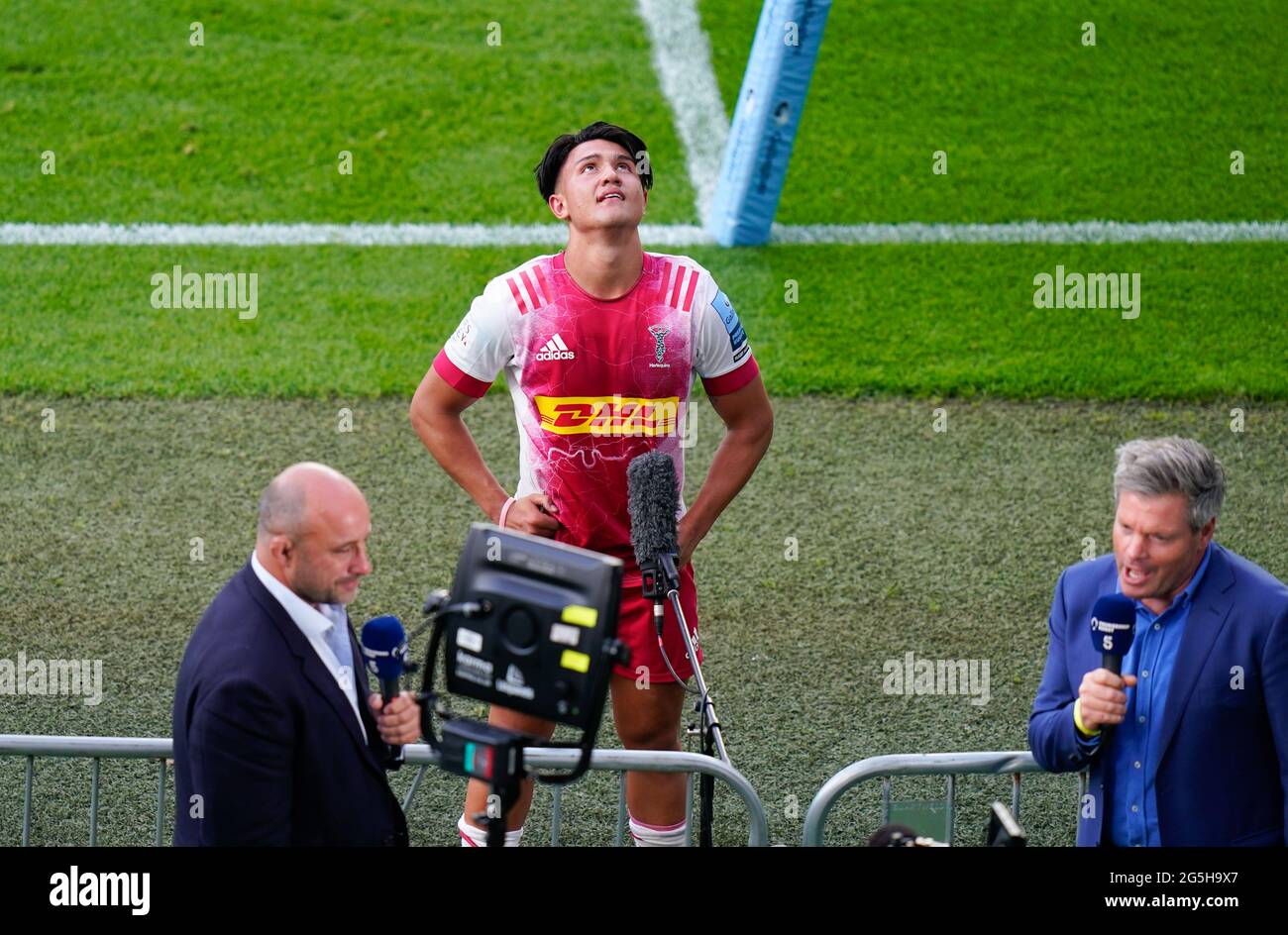 Harlequins fly-half Marcus Smith waits to be interviewed after the Gallagher Premiership Rugby Final, Exeter Chiefs -V- Harlequins, on Saturday, June Stock Photo